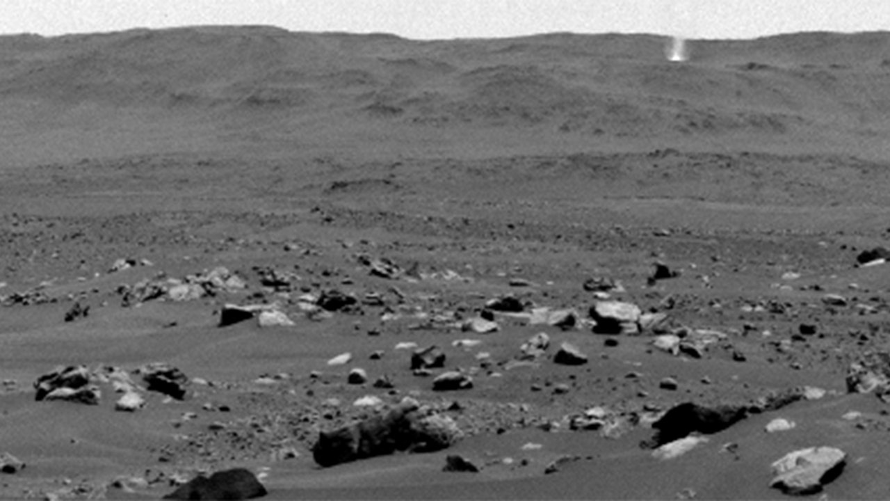 NASA's Mars Rover spies a 200-foot-wide dust devil moving across the Red Planet's surface